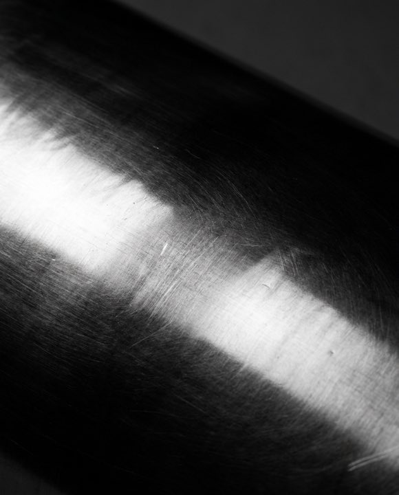 Polished copper sheet in raking light